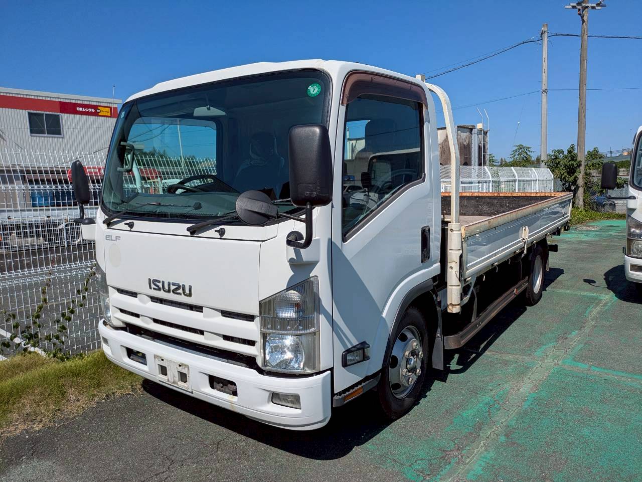 いすゞ エルフ 平成26年式 TKG-NPR85ARの買取写真